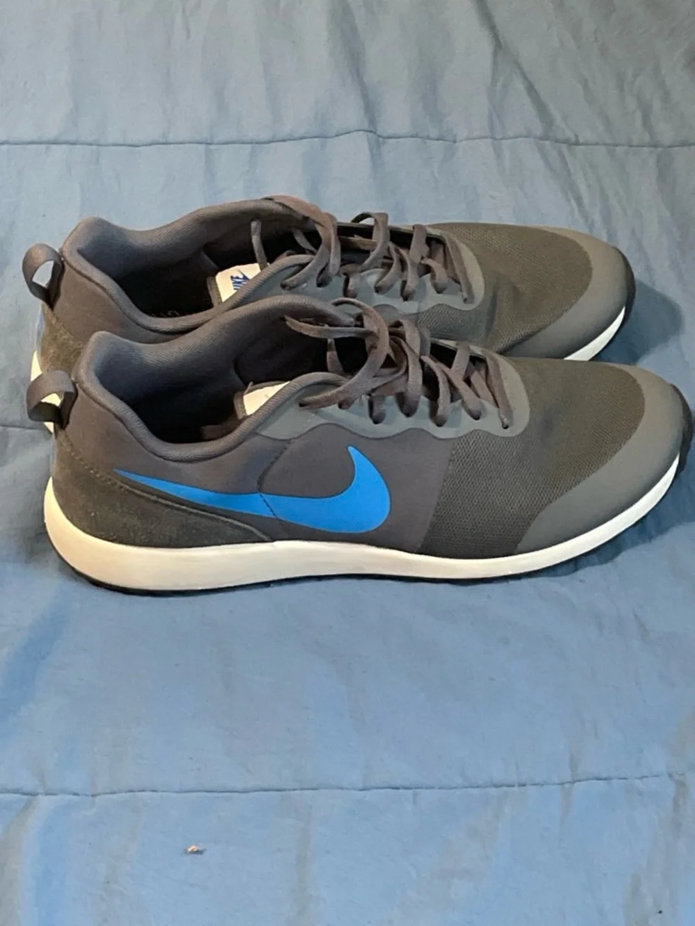 Nike Gray Sneakers with Blue Swoosh